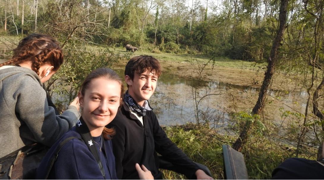 Volunteers observing animals on a trip to Nepal 