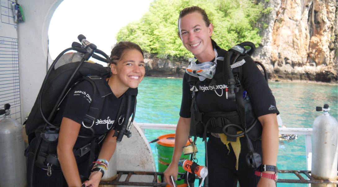 Diving volunteers in Thailand on a boat