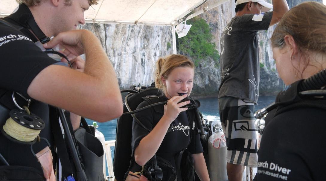 Conservation volunteers waiting on a boat