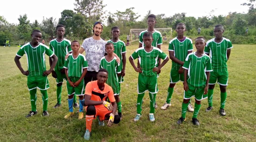 A soccer coach volunteer in Ghana