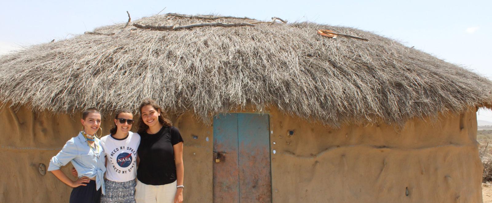 A group of gap semester students experience cultural immersion in a Maasai village in Tanzania, East Africa.