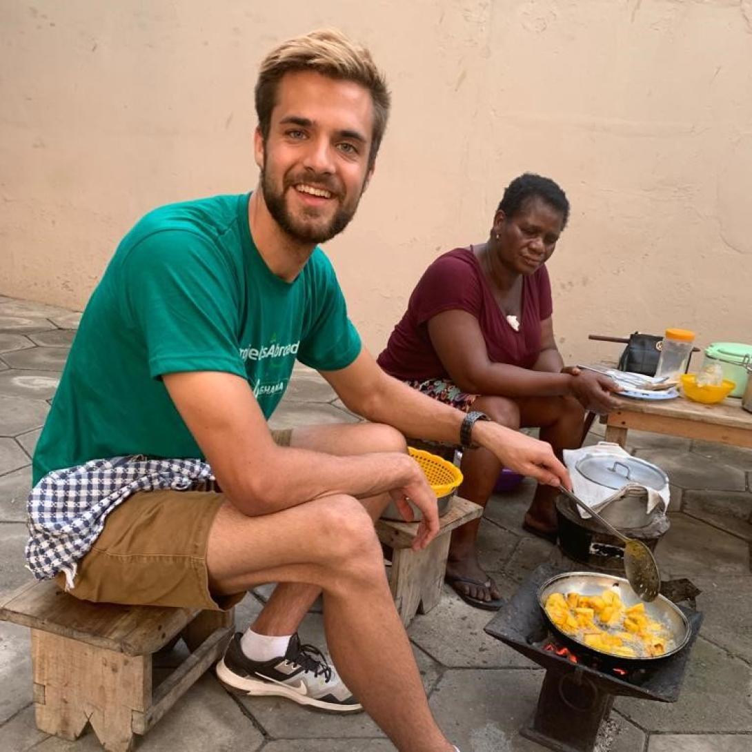 Volunteers learn to cook local food