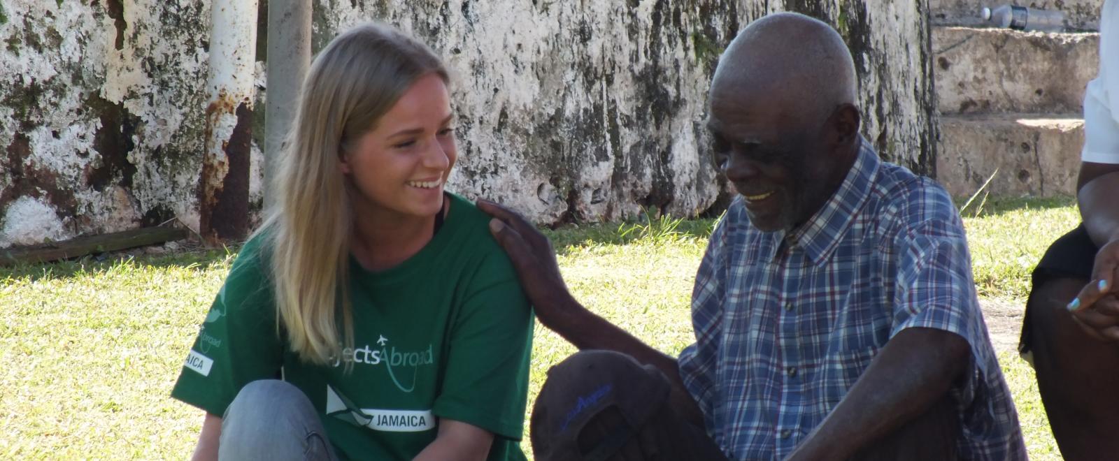 A psychology intern abroad has a friendly conversation with a local man. 