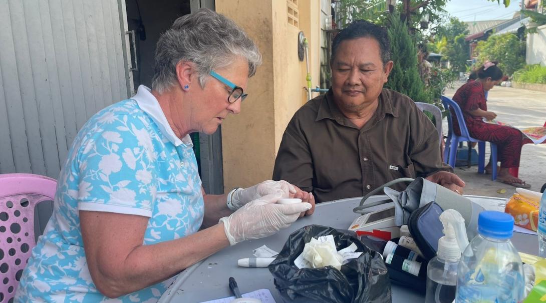 Older intern health checkup in Cambodia