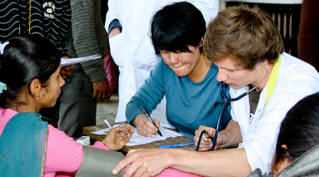 Pre-Med intern working with patients