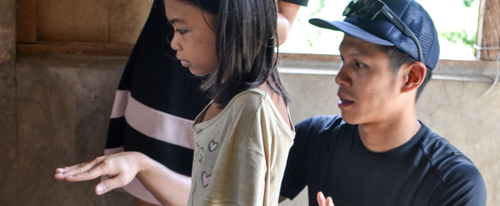 Projects Abroad Occupational Therapy Intern works with a child in the Philippines