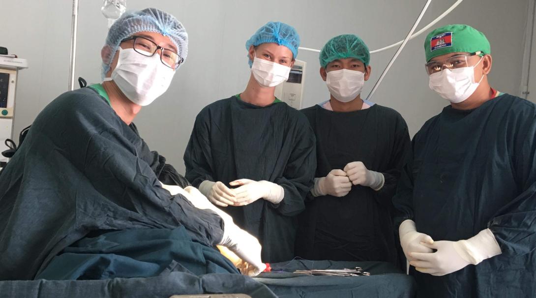 A doctor with medical students in Cambodia