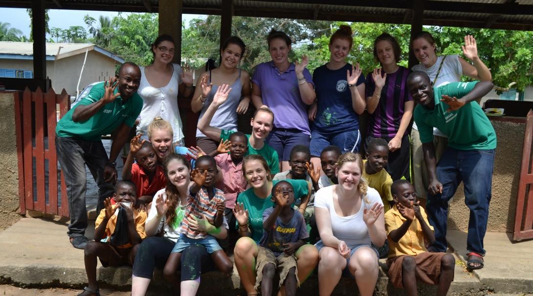 Interns and local staff in a group photo on our medical internship for teenagers in Ghana