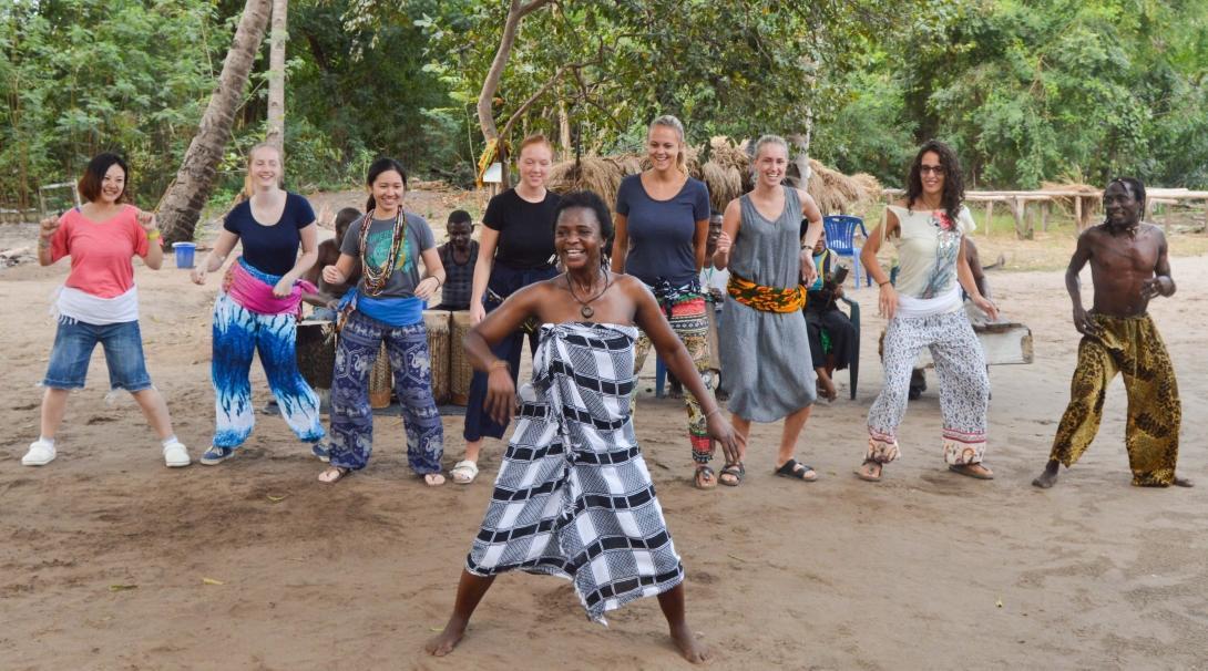 Volunteers learn about local culture during volunteer work in Tanzania for teenagers