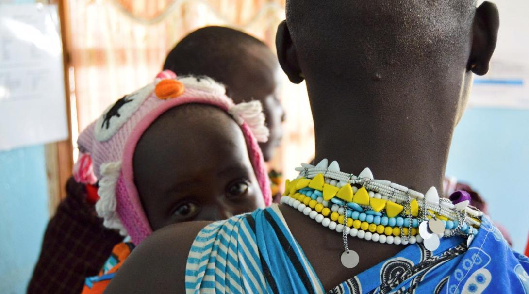 An intern from Projects Abroad photographed a local Maasai woman holding a baby at a medical outreach centre during her midwifery internship in Tanzania. 