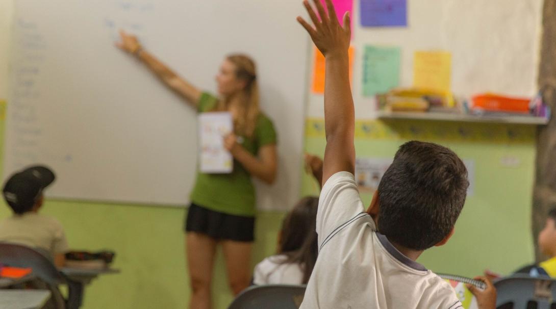 A volunteer splits her time between teaching English at a local school and learning Spanish in Ecuador. 