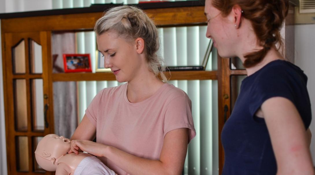 High school students practise first aid during their medical internship in the Philippines