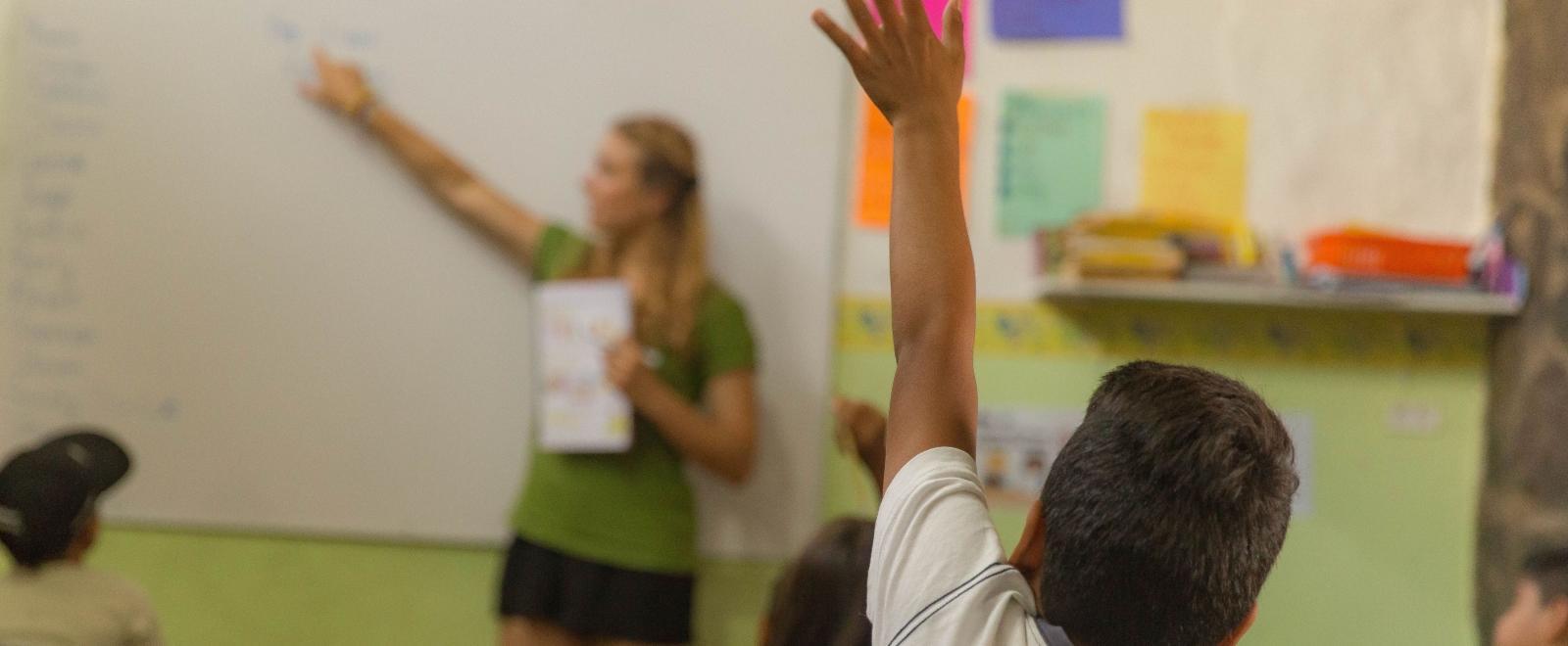 A Projects Abroad volunteer teaching English in Ecuador