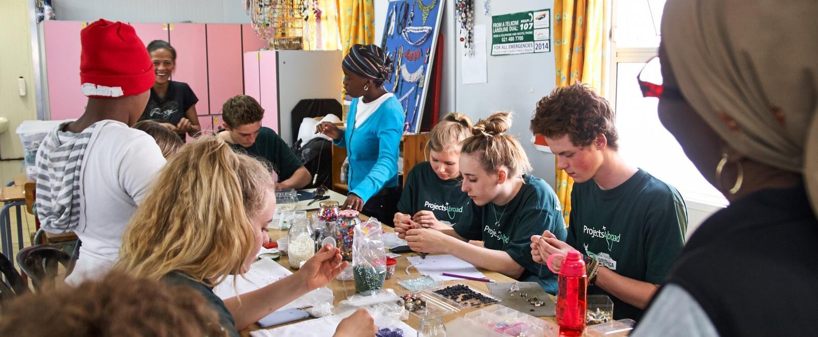 International Development interns work with businesswomen to support a local community during an internship project in South Africa.