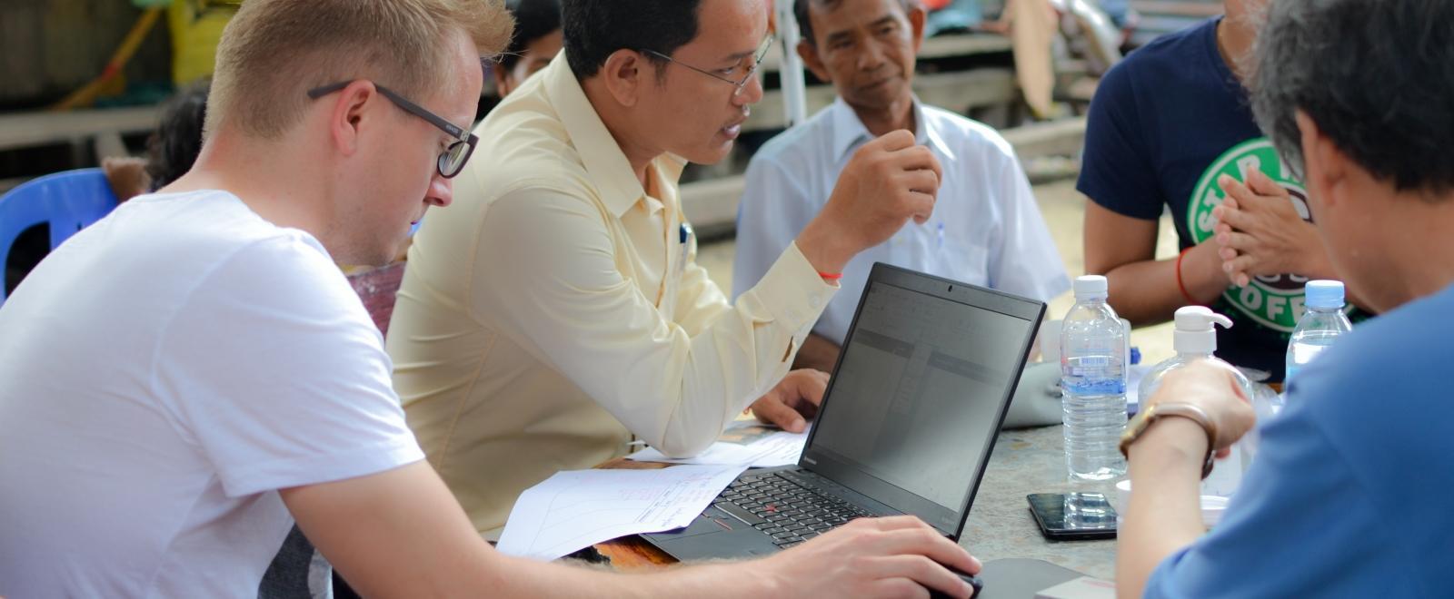 A Projects Abroad volunteer recording data after a medical outreach to contribute to our long-term goals.