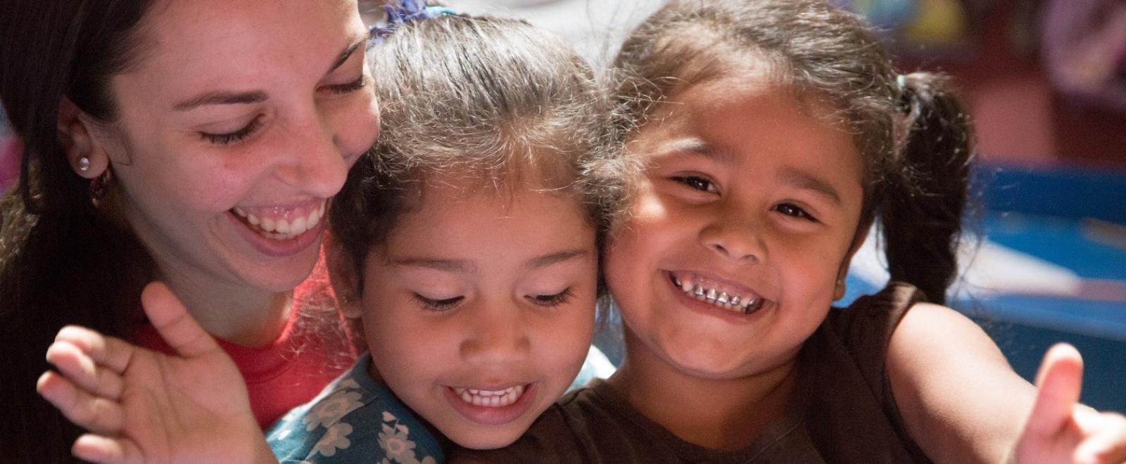 Happy children with their teacher at one of Projects Abroad's volunteer teaching placements in Costa Rica