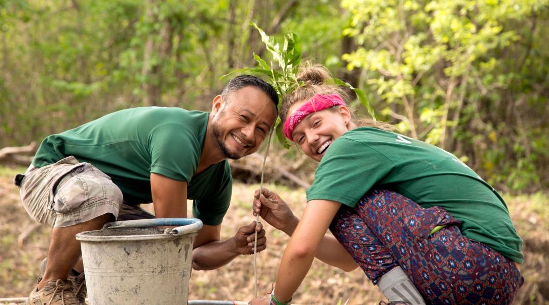 A Projects Abroad Conservation volunteer planting a tree on one of our best volunteer abroad programs.