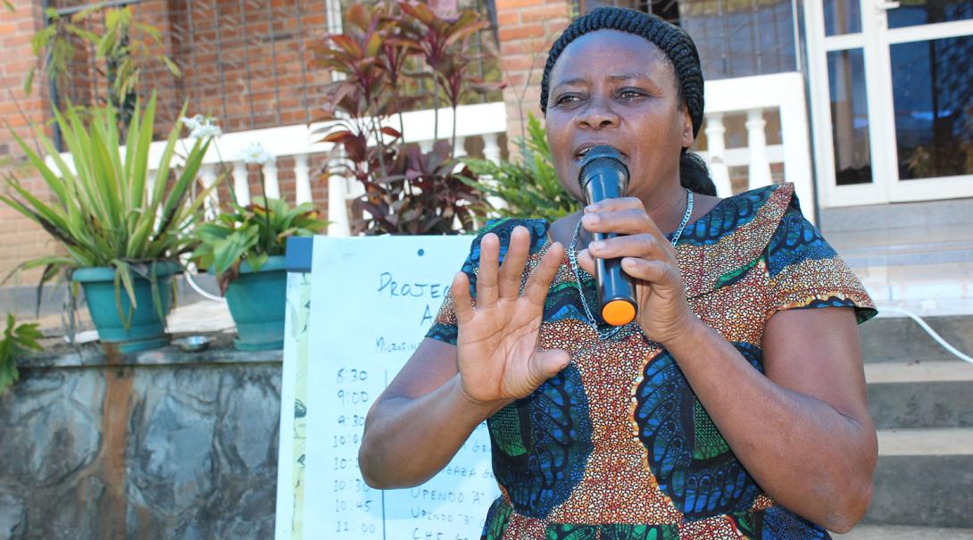 A local woman in Tanzania giving a speech about women’s empowerment