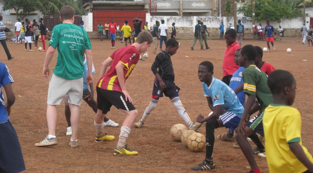 High School Football Coaching volunteers prepare a training session in Ghana with Projects Abroad.