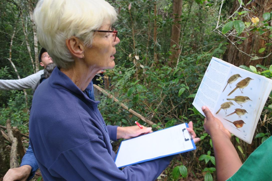 An older Projects Abroad volunteer bird watching in Madagascar on her grown-up gap year