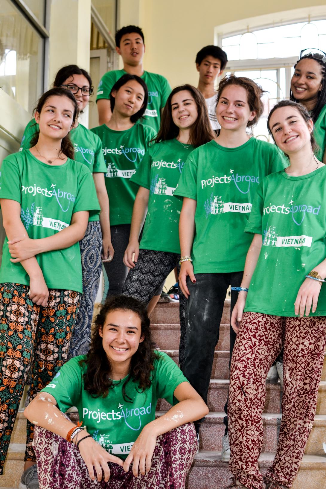 An international group of Projects Abroad volunteers take a break during their high school special project.